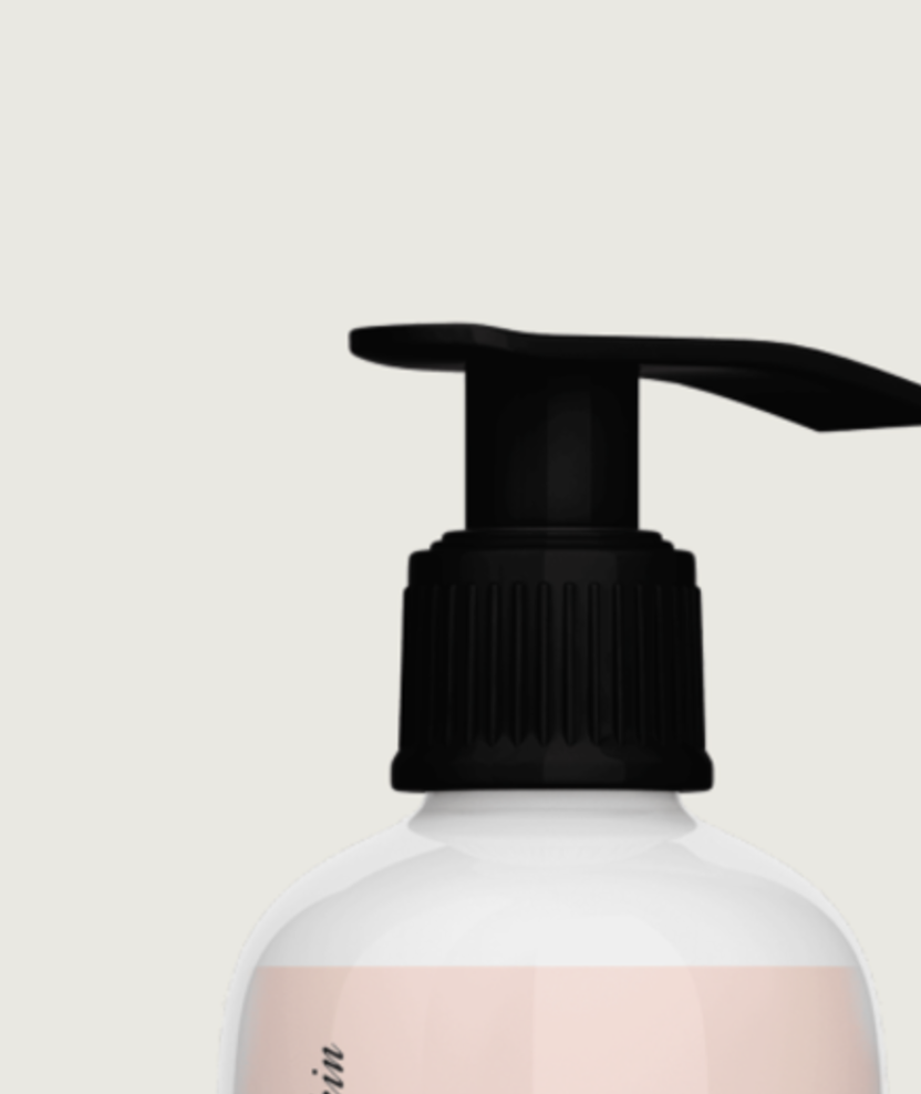 The upper body and pump of the AHA Renewal Body Lotion bottle