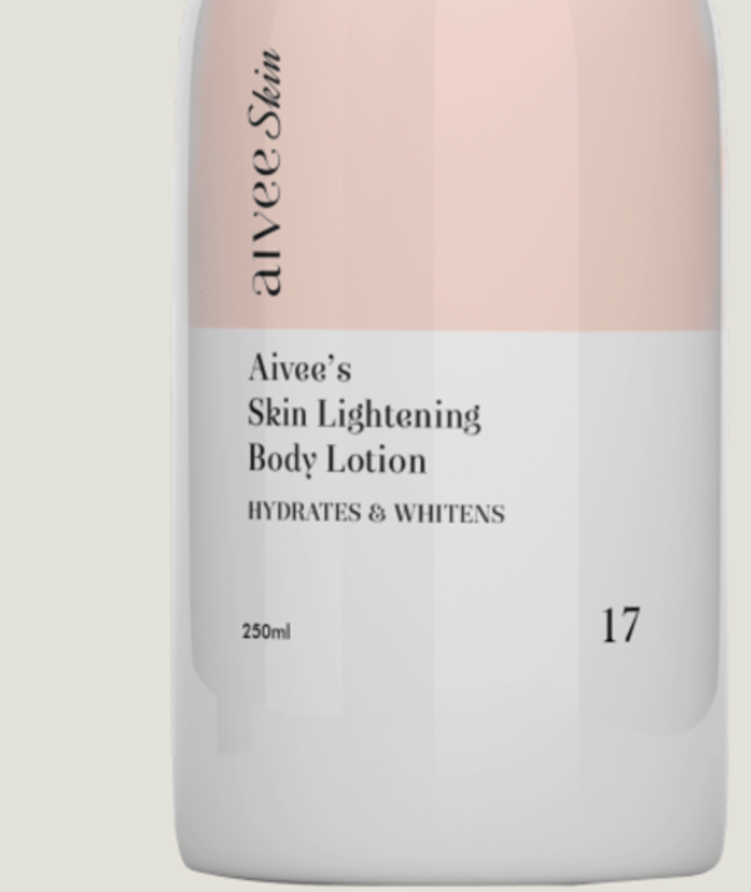The base of the AHA Renewal Body Lotion bottle on its cream backdrop