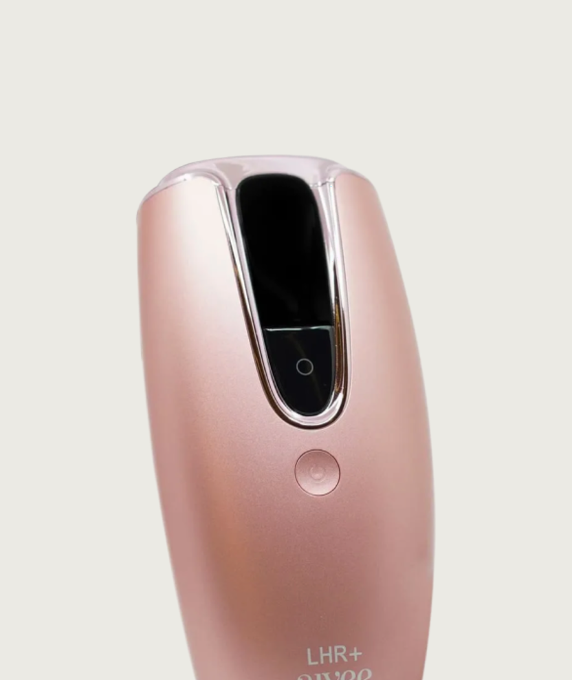 Aivee Glass rose-gold handheld device against a soft cream backdrop