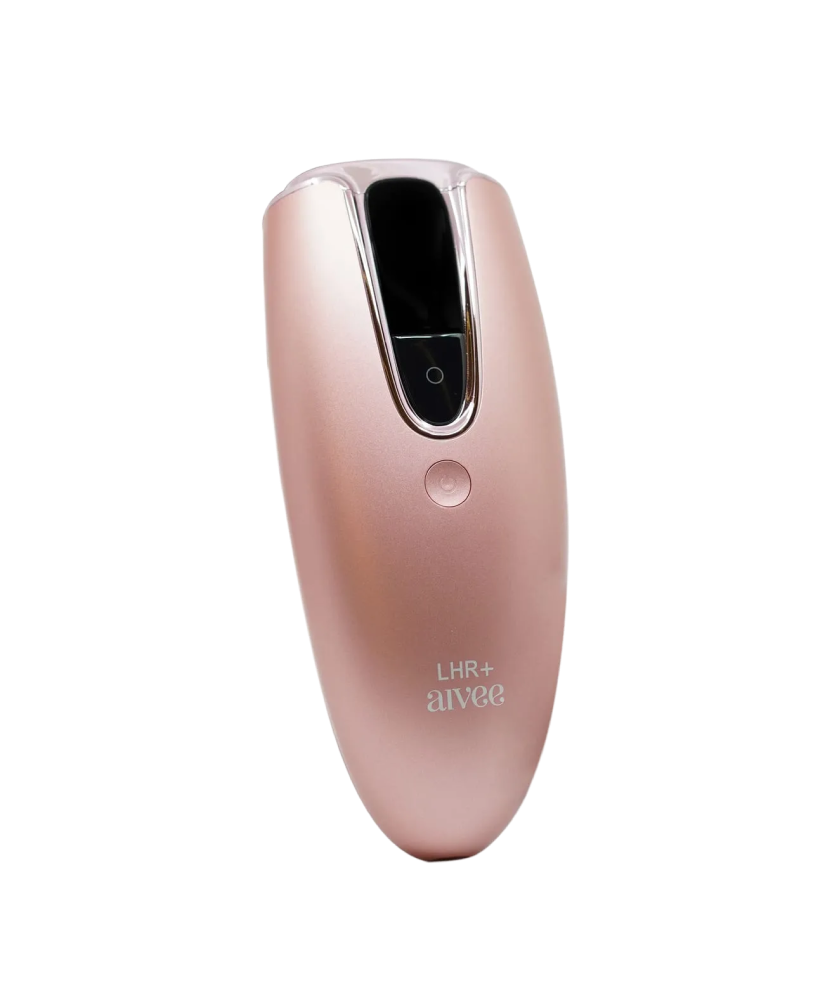 Aivee LHR+ rose-gold handheld hair removal device against a soft cream backdrop