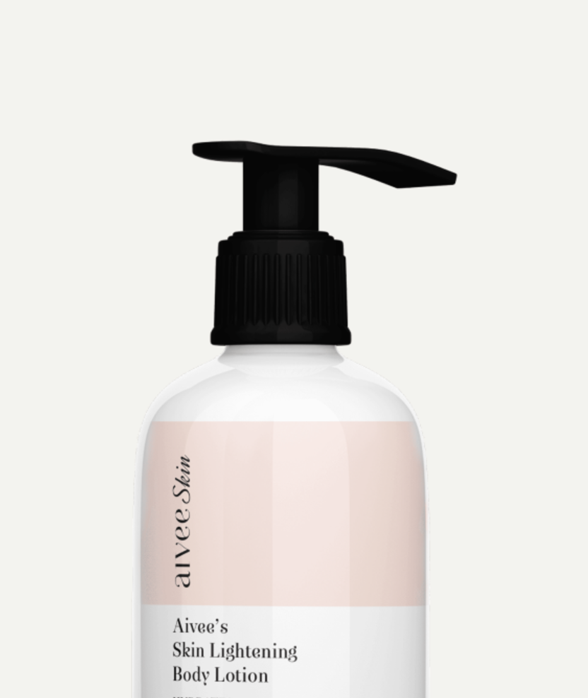Brightening Vitamin C Serum pump bottle against a soft cream backdrop