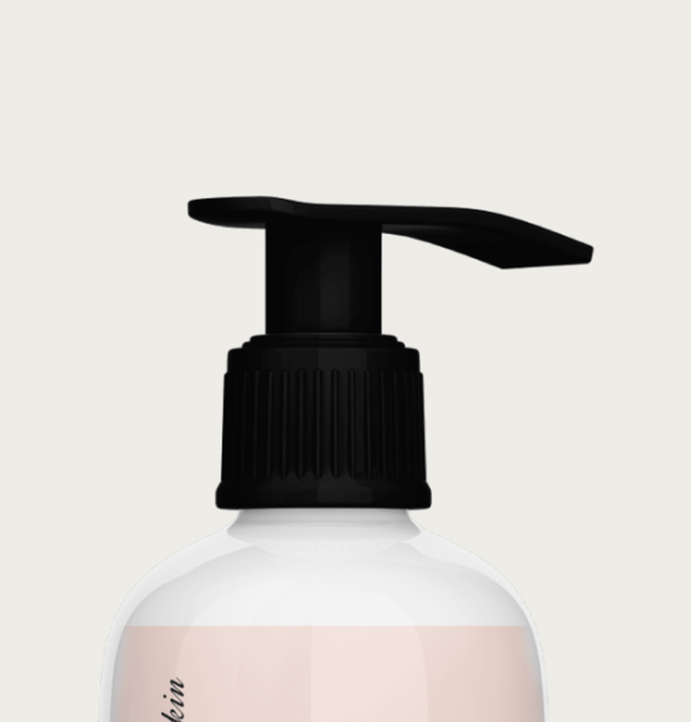 The pump and ribbed collar of the Aivee Skin Lightening Body Lotion bottle