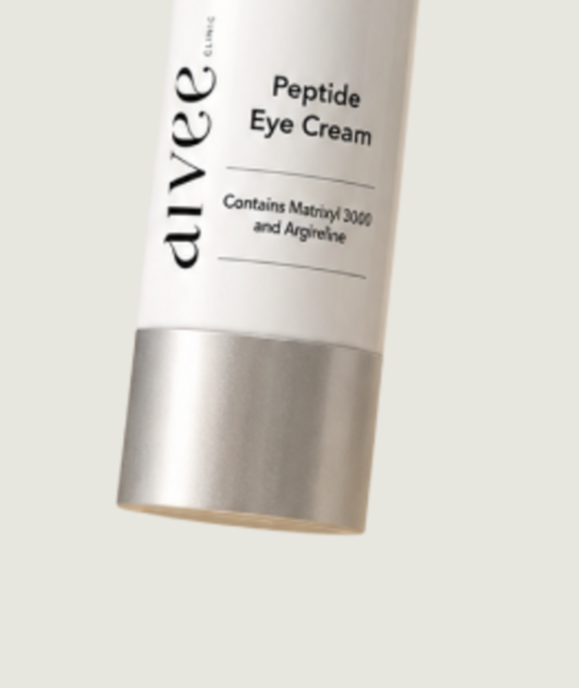 The lower body and base of the Aivee Peptide Eye Cream bottle on its cream backdrop