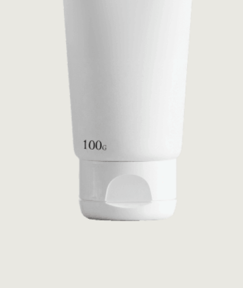 The lower body and base of the Probio Plus Cleanser tube on its cream backdrop